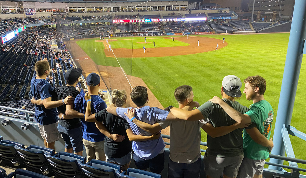 Residents at a Toledo Mud Hens game