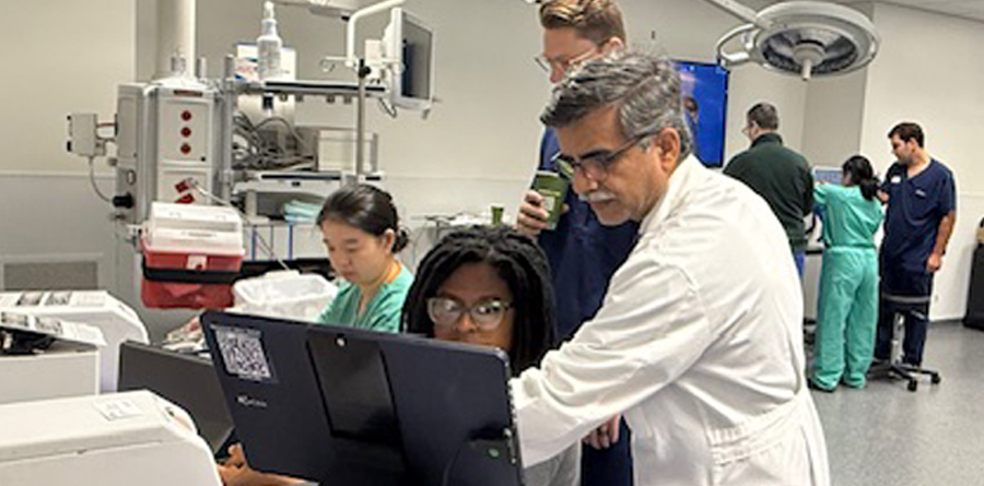 Residents working in the simulation center