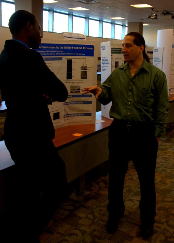 Dr Giovannucci in conversation with poster presenter