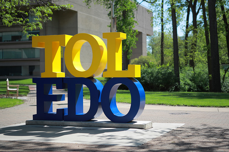 The courtyard on Health Science Campus with the TOL-EDO signage.