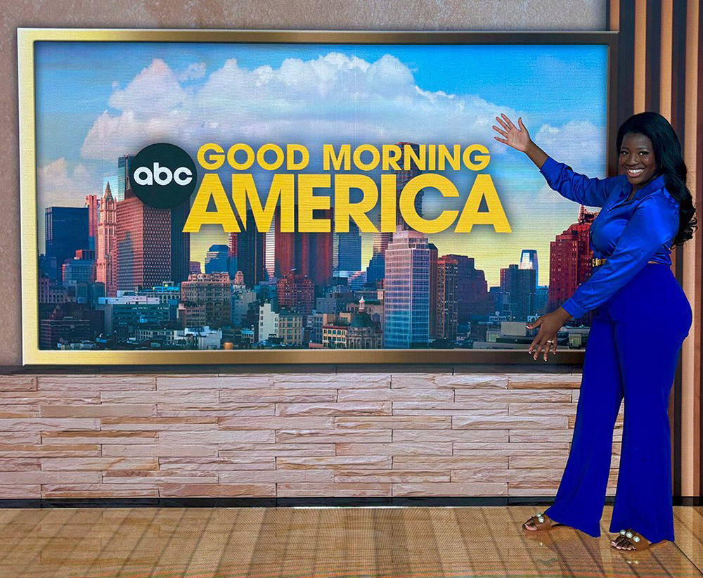 Photo of Dr. Alexandra-Elise Dakaud Patterson, a general surgery resident who also is completing a master’s in cosmetic science and formulation design, who spent the summer with the ABC News medical unit, posing on the set of Good Morning America.