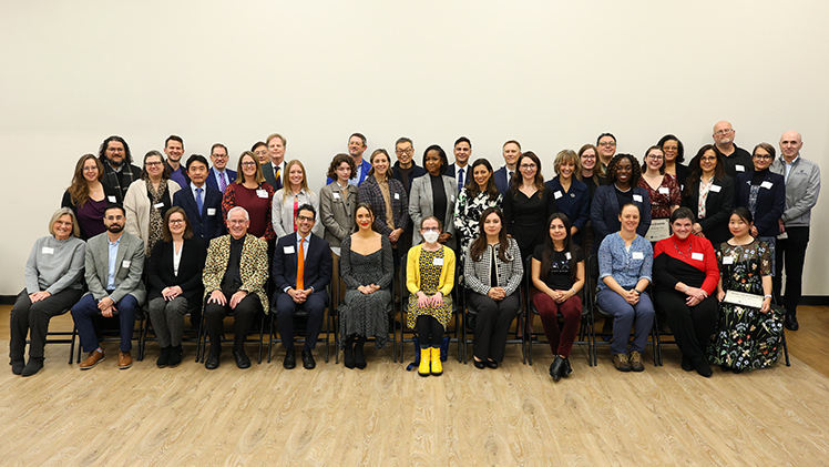 Large group photo from the Tenure and Promotion Reception on Thursday, Oct. 30, in Thompson Student Union. The photo includes Provost Mitchell McKinney and President James Holloway.