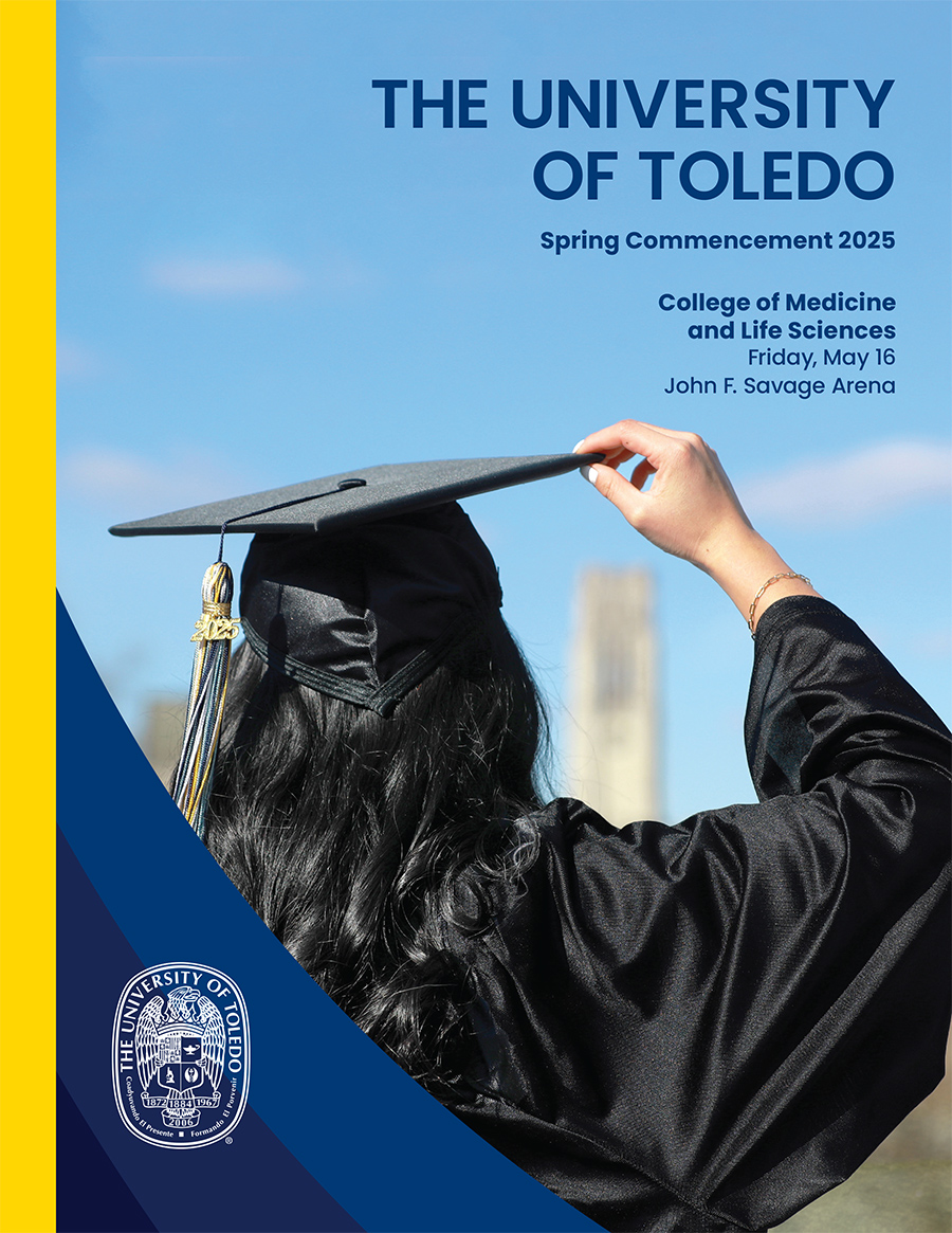 Commencement program cover featuring a graduating student holding her cap with the University Hall clocktower on main campus in background.