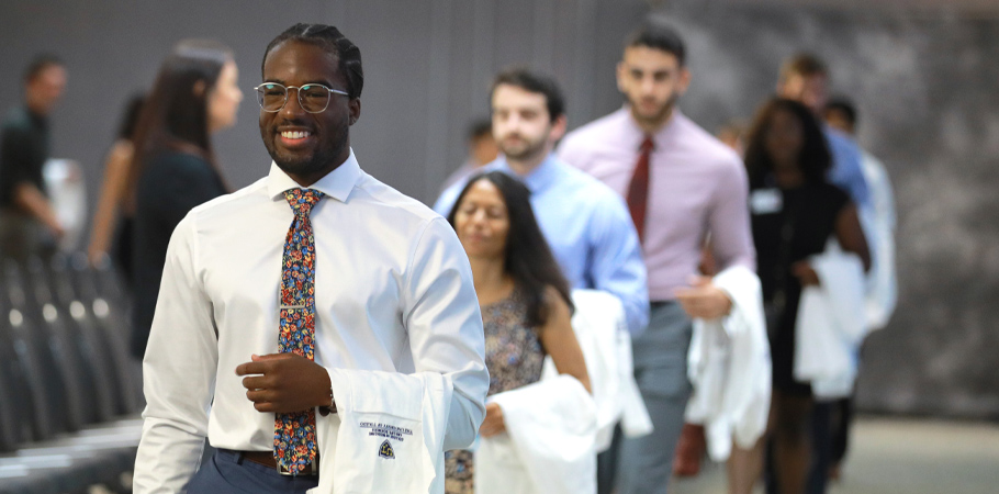 Student processing in during the White Coat Ceremony 