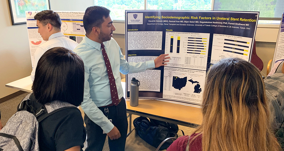 Student presents during research forum