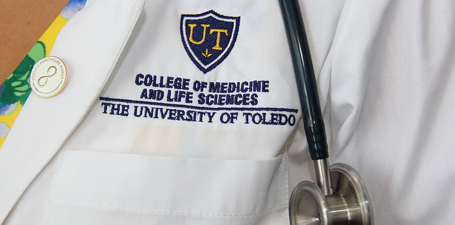 Student wearing White Coat 