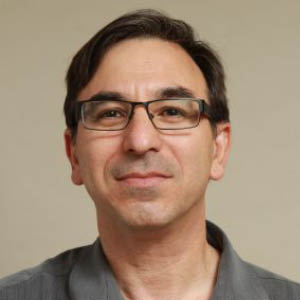 headshot of man (Dr. Tomer Avidor-Reiss)