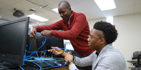 Black engineers working together 