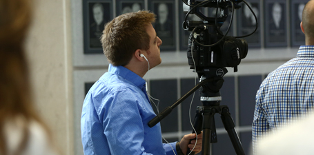 Cam Norton filming an interview