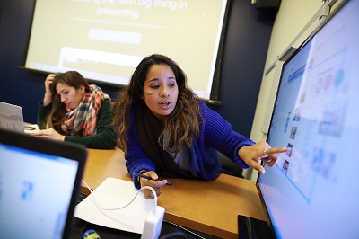 student with computer