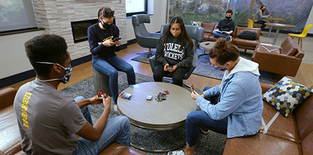 Students playing cards and relaxing