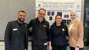 Dr. AbouAlaiwi and students attending the University of Toledo The Cell Architecture and Dynamics (CAD) research symposium