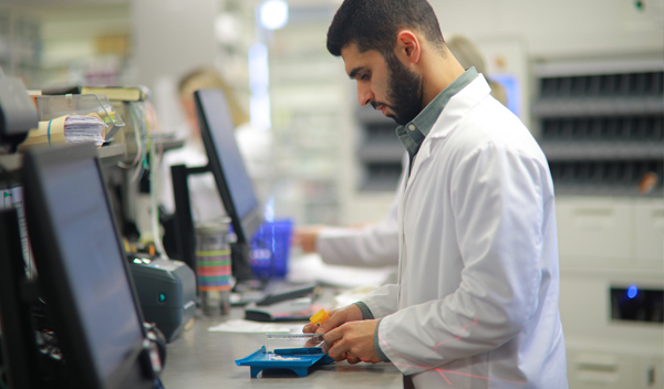 Pharm.D. working in a lab