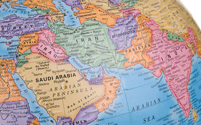 close up image of a globe featuring countries of the middle east