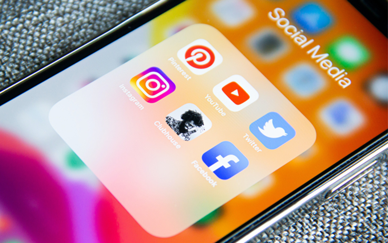 open smart phone screen dsiplaying various social media apps