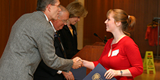 student receiving certificate Financial Aid