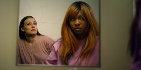 two young women in a bathroom