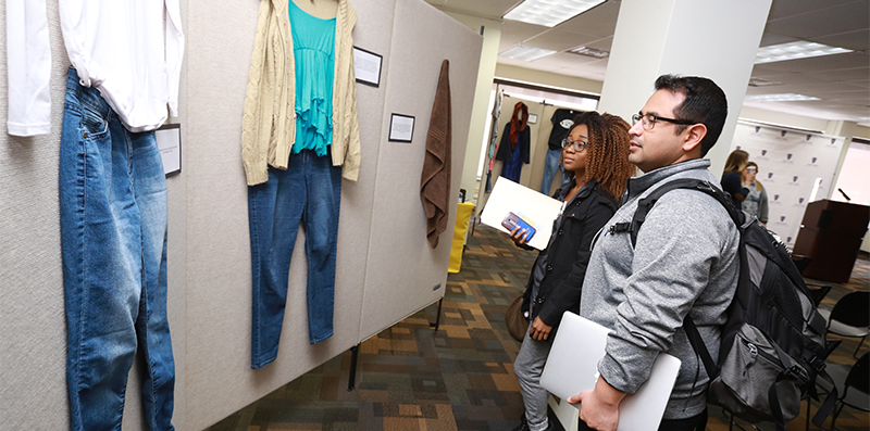 students looking at what were you wearing display