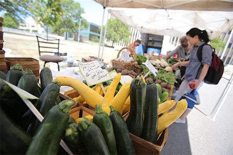 student at farmers market