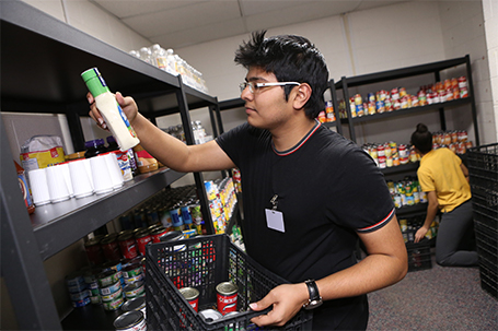 students working in the food pantry