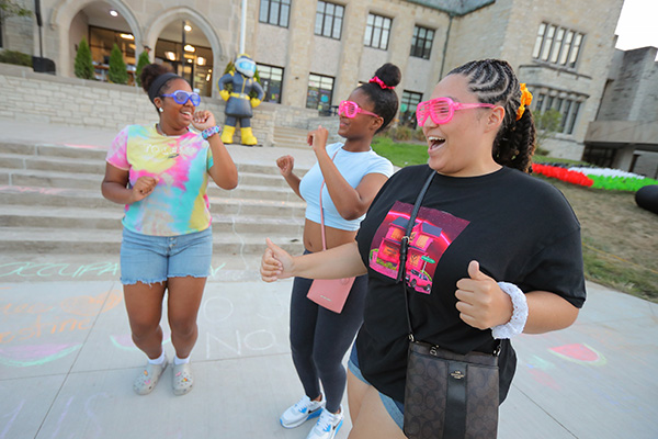 Students dancing outside the student union.