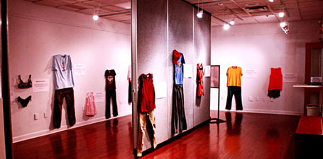 People looking at What Were You Wearing Exhibit