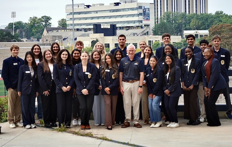 group of Presidential Ambassador student leaders posing for a photo with President James Holloway