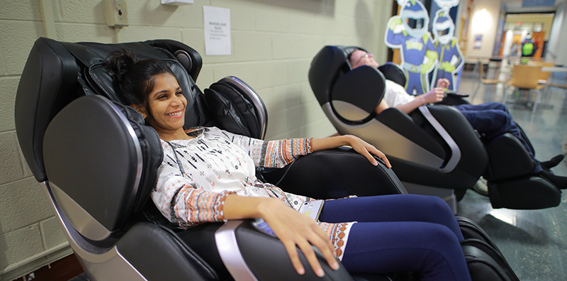 Student enjoying massage chair