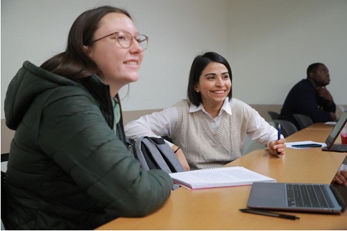 two female students in class