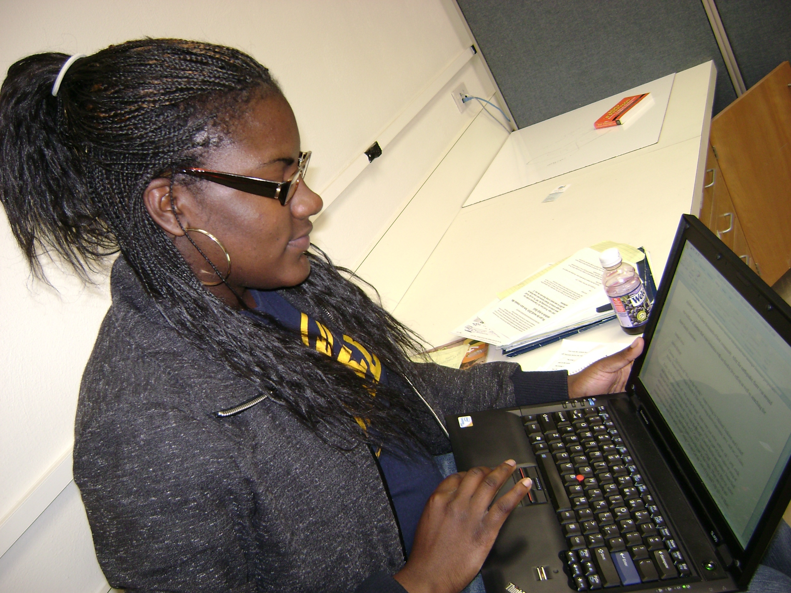 woman working on her computer