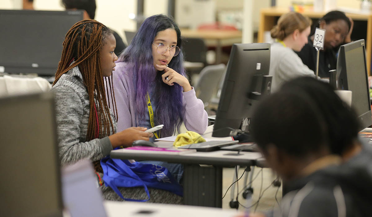 two trio students studying