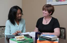 Smiling UT Liberal Studies Student with Adviser